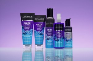 Full John Frieda Dream Curls range against a purple background